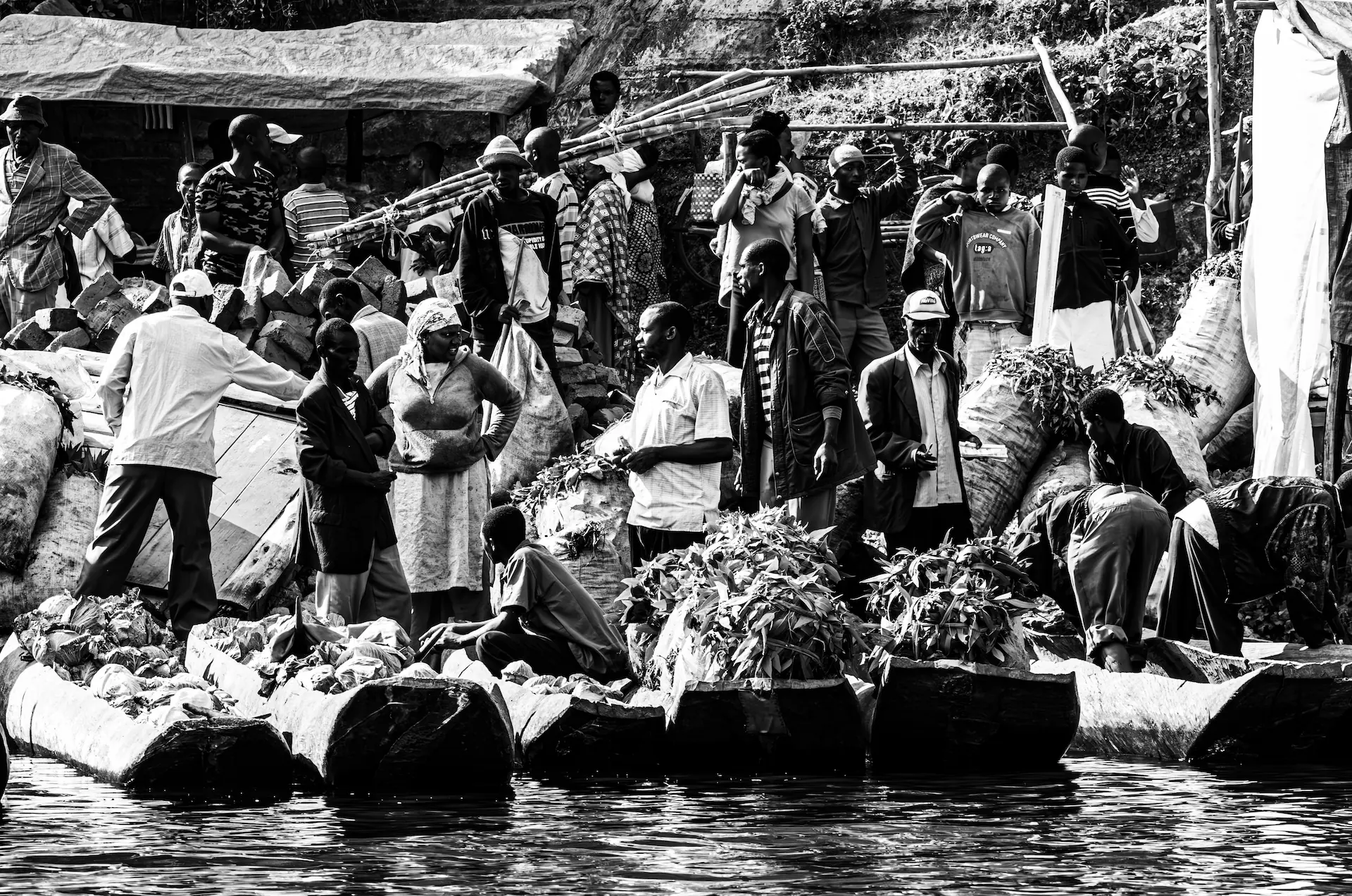 Black and white tea market scene on the shore of Lake Bunyonyi, Uganda.