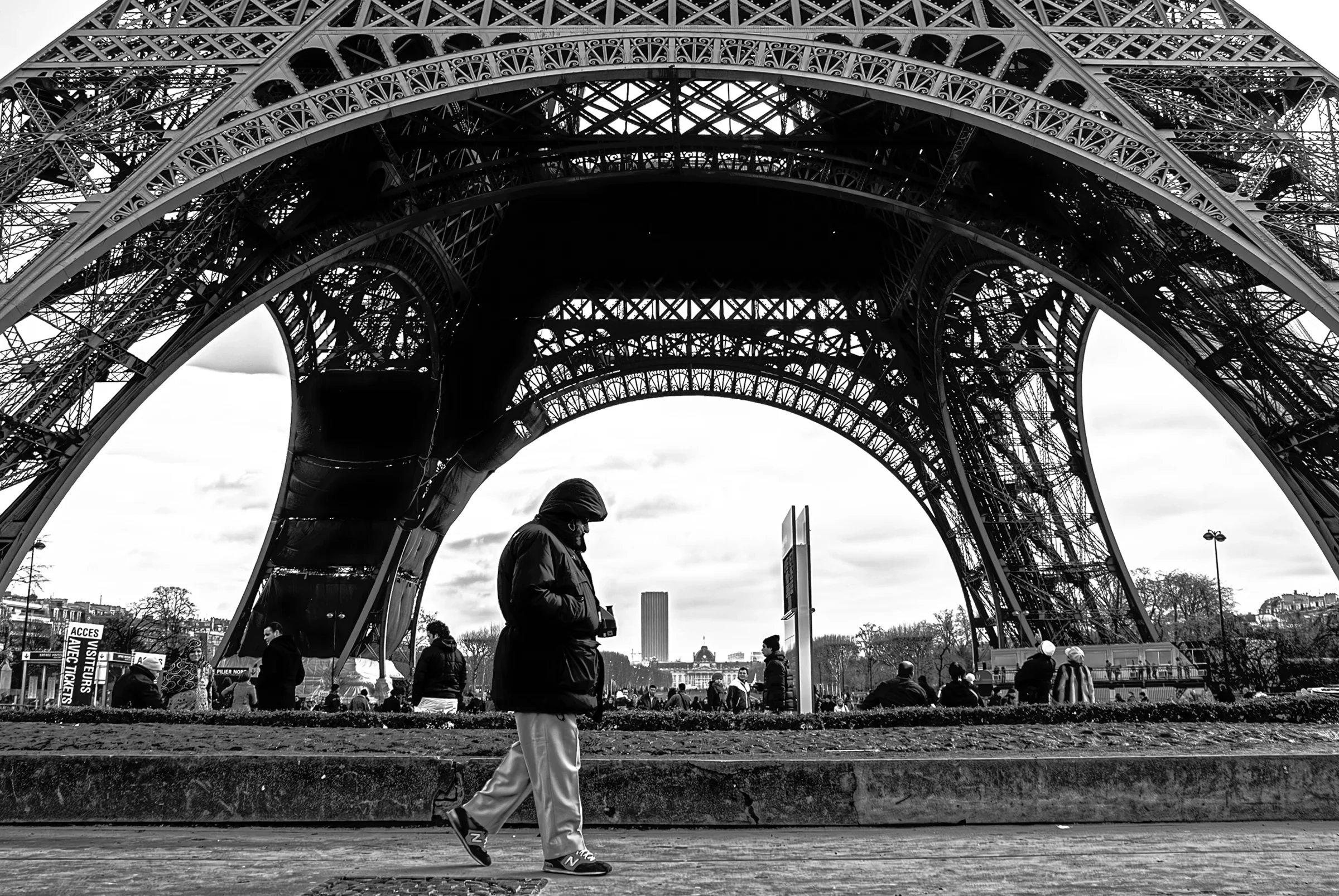 Eiffel Tower in Paris, France, taken from a low angle.