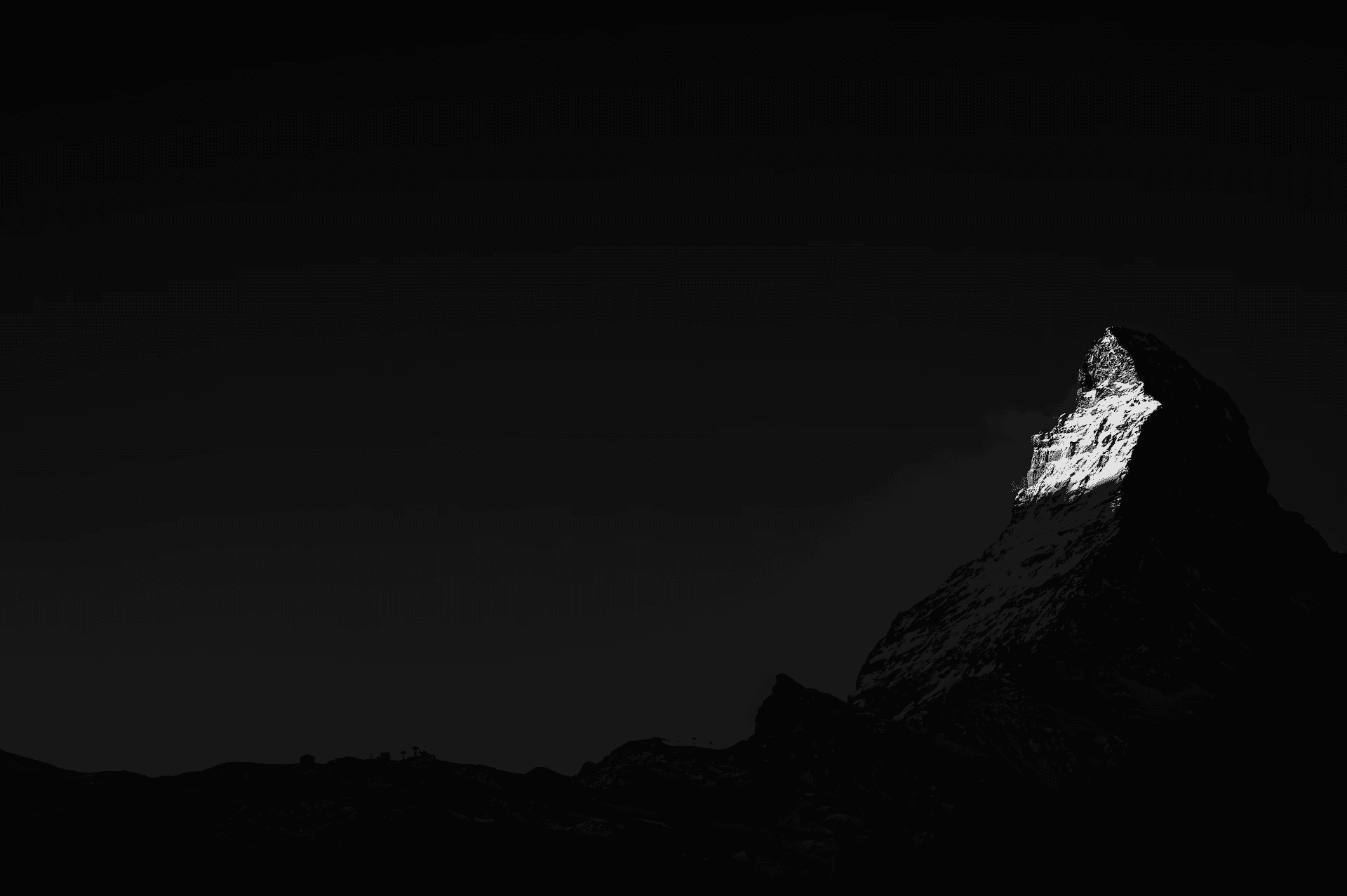 Matterhorn Dawn Light: Alpine Peak Awakens Matterhorn Dawn Light Alpine Peak Awakens in Zermatt in monochrome.