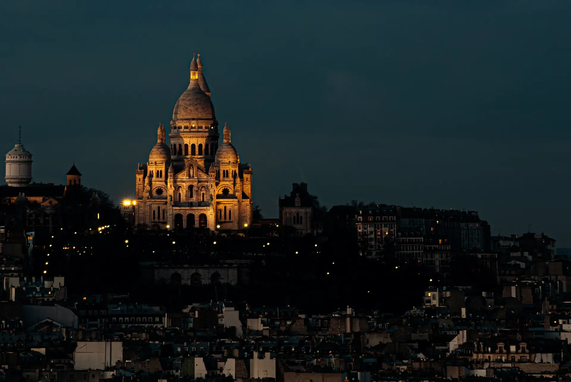 Sacré-Cœur at Night Parisian Illumination in Paris in architectural light.