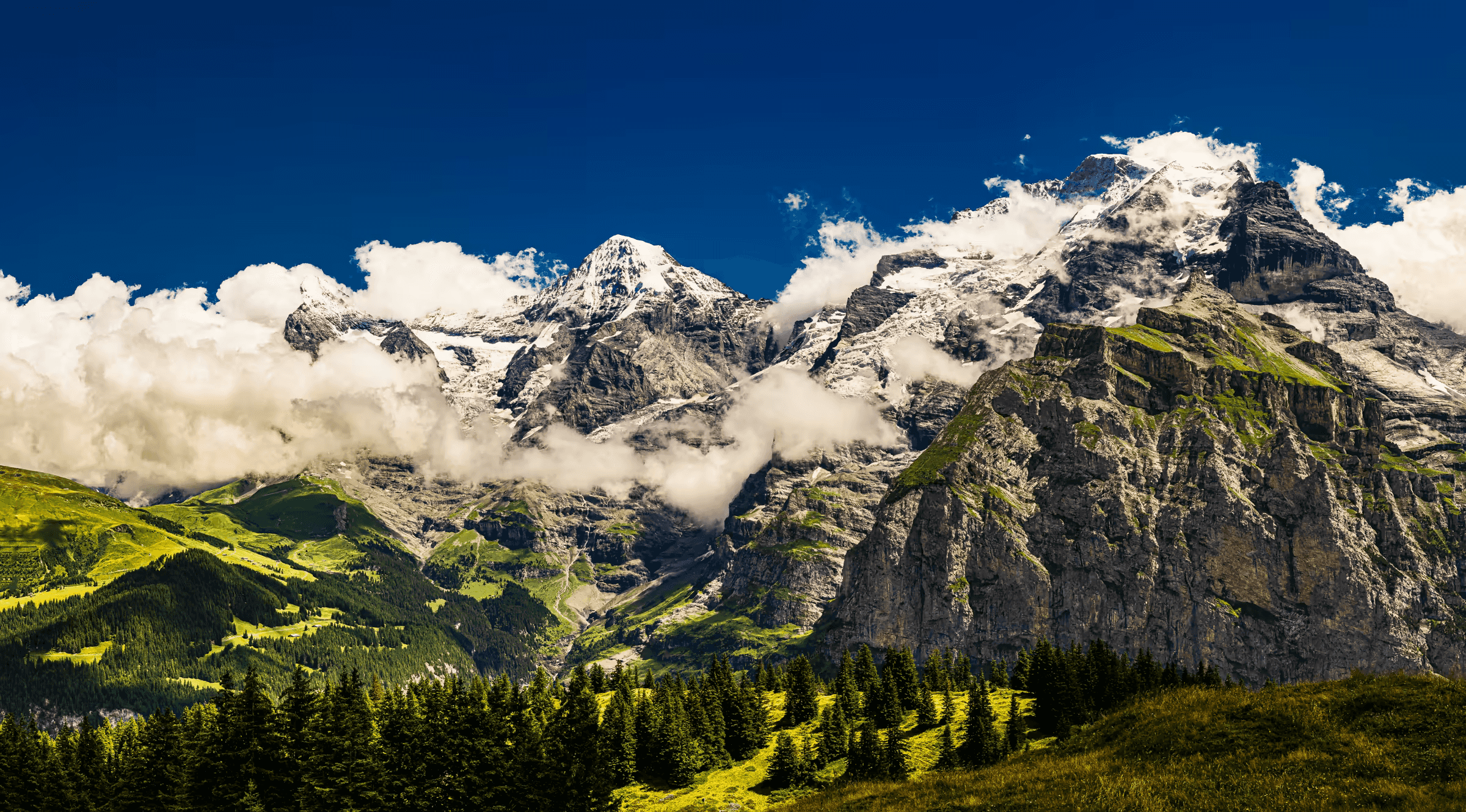 Alpine Majesty: Eiger, Mönch, and Jungfrau Eiger, Mönch, and Jungfrau mountains in the Swiss Alps.