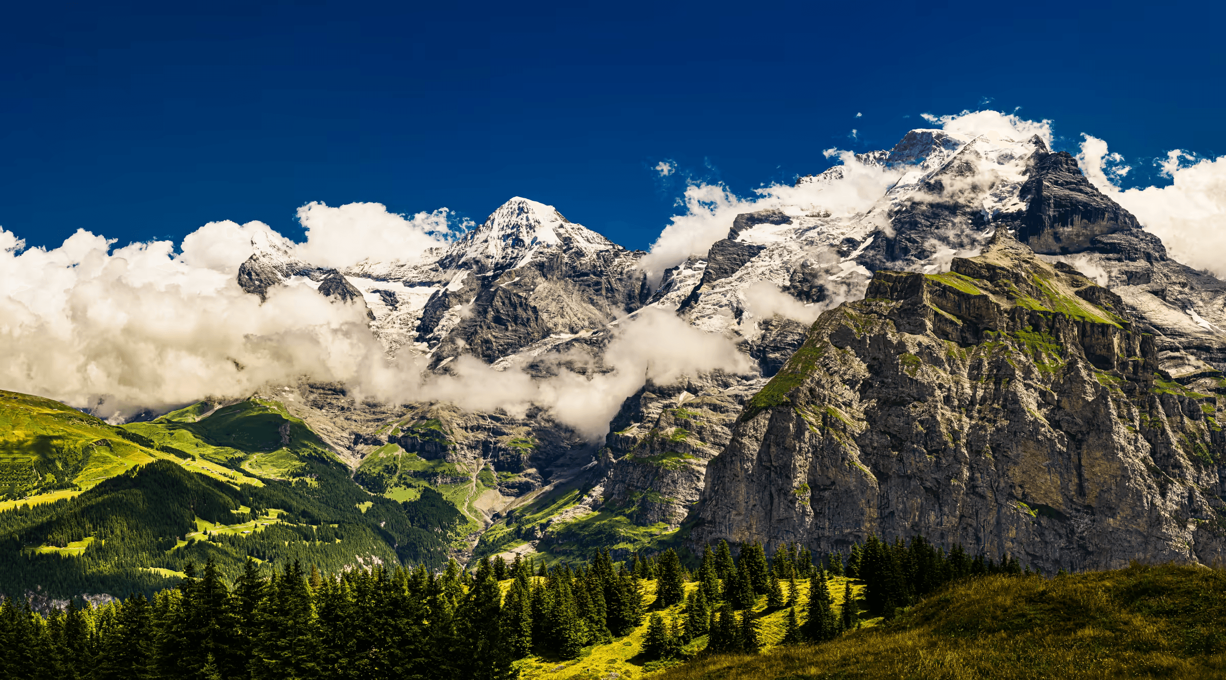 Eiger, Mönch, and Jungfrau mountains in the Swiss Alps.