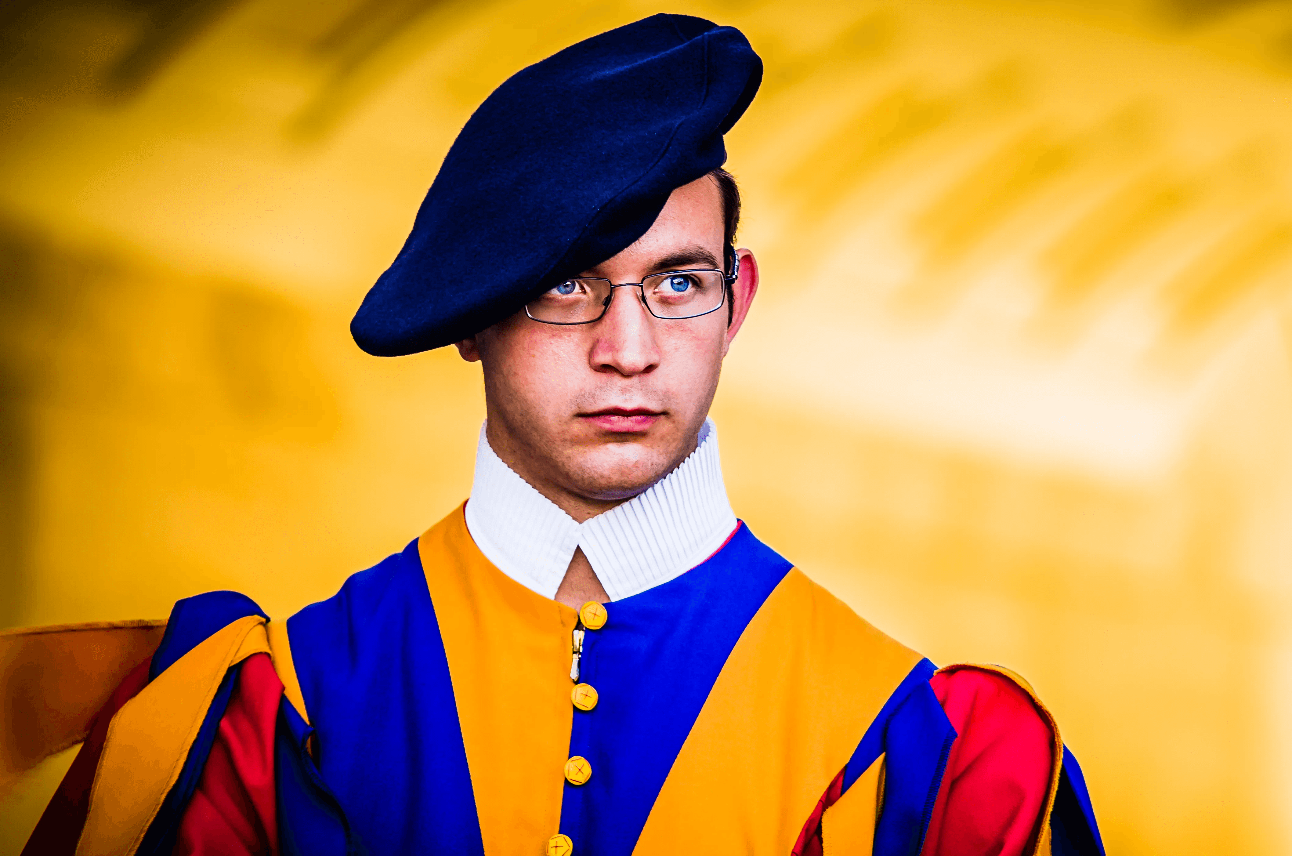 Close-up color portrait of a Swiss Guard at the Vatican.