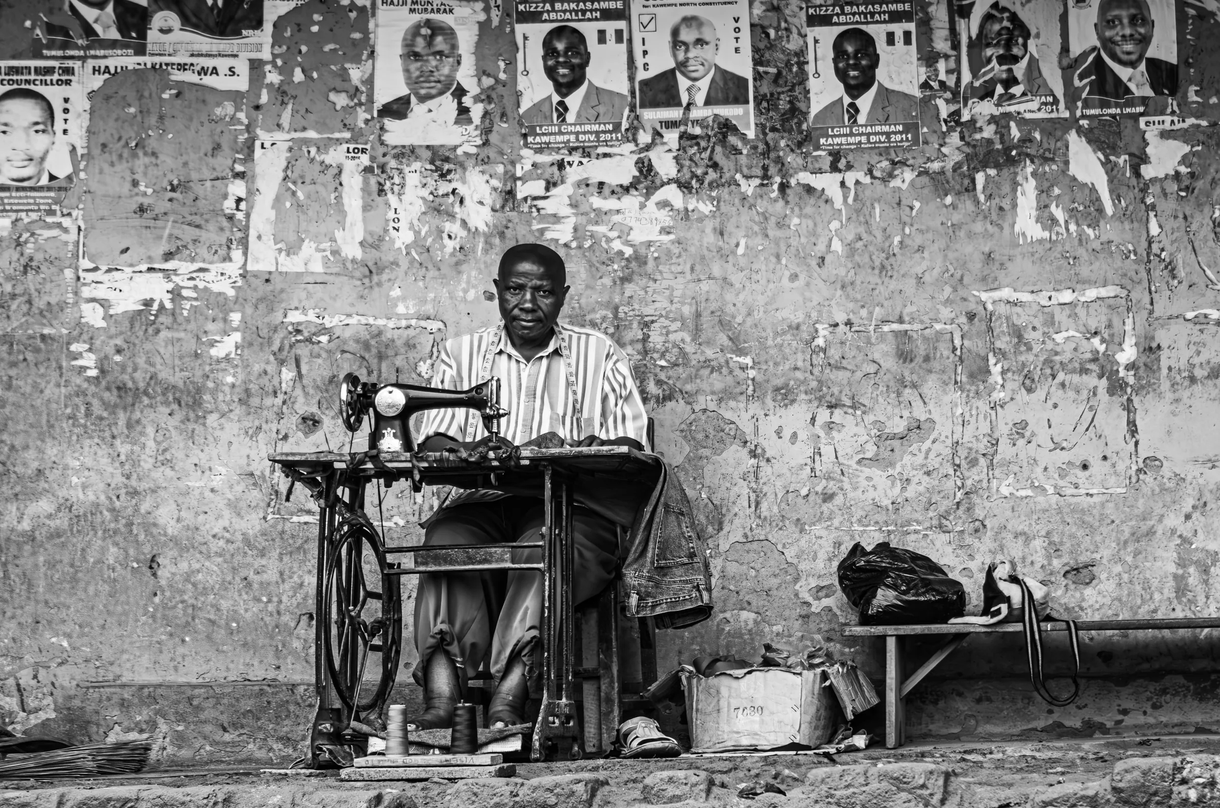 Street Tailor Poster Wall in Uganda.
