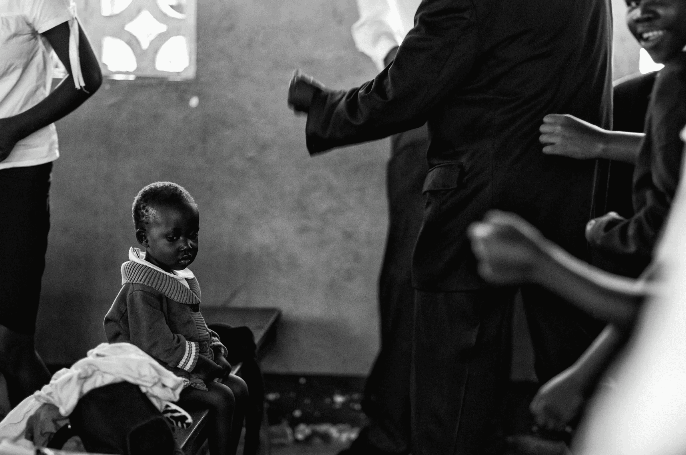 Click to view in fullscreen Scene from in a quiet portrait in Uganda in monochrome.
