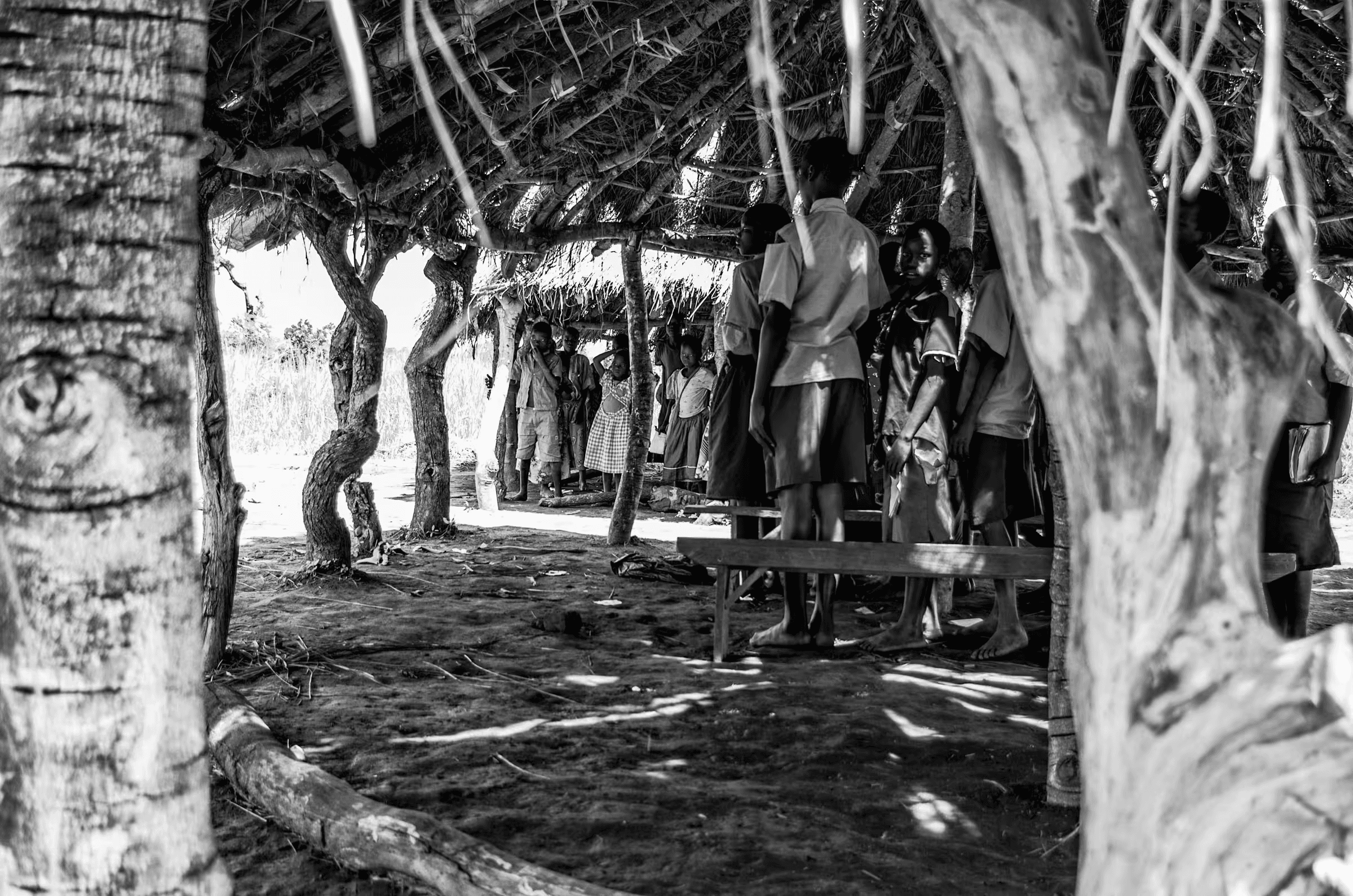 Ugandan Village Gathering in Uganda in daily life in monochrome.