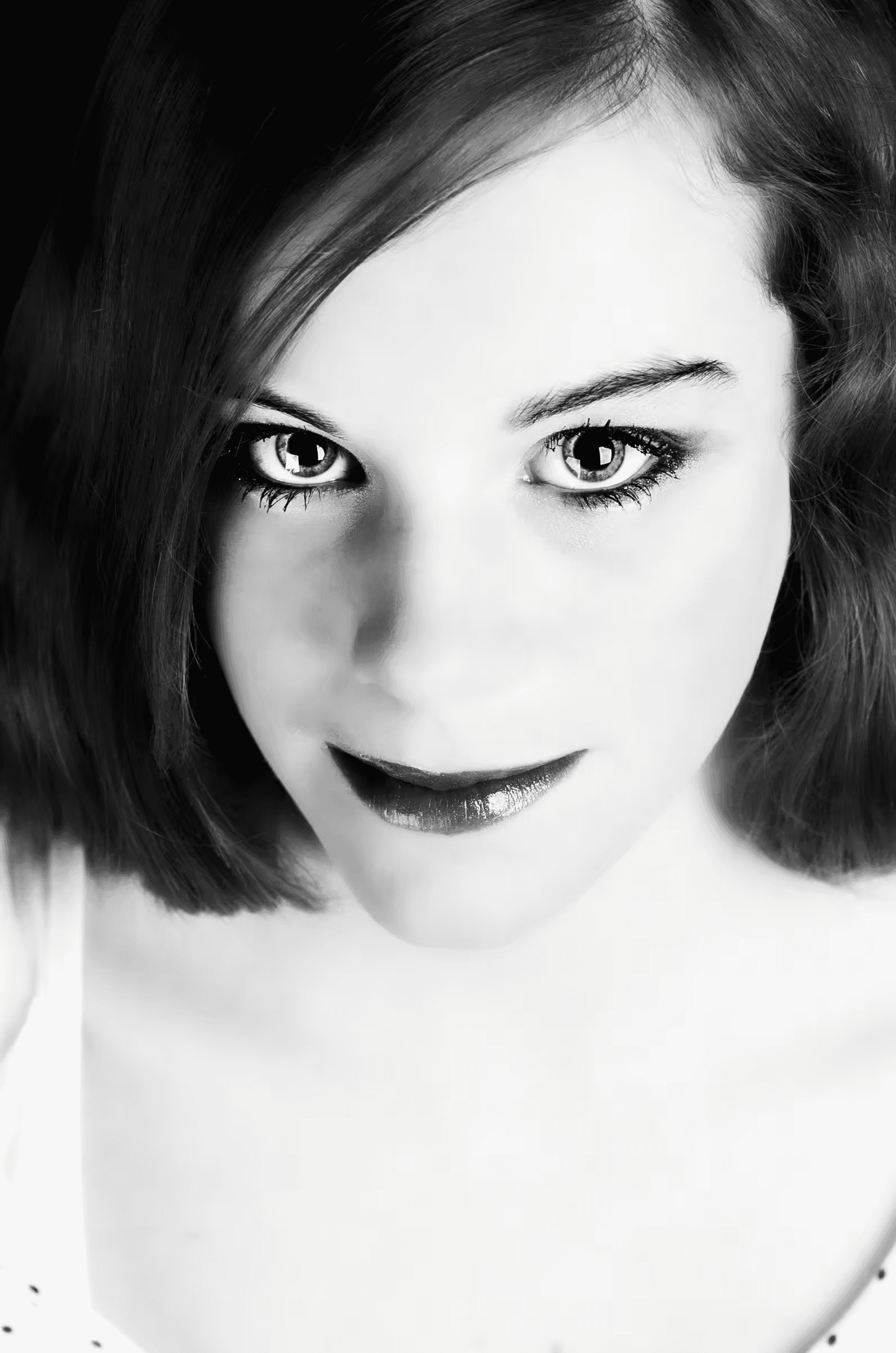 Intense Gaze: Portrait Study Intense Gaze Portrait Study in a quiet portrait in monochrome.